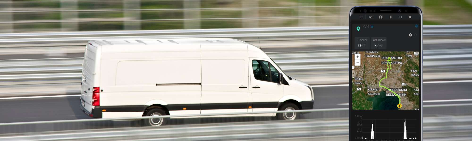White van on a road with a smartphone displaying a map app.